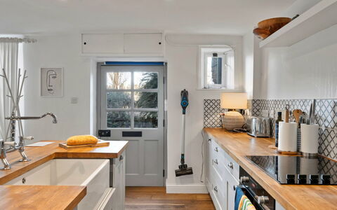 Horseshoe Cottage: Countertop, Kitchen, Furniture, Cabinetry, Interior Design, Kitchen Appliance, Flooring, Major Appliance, Wood, Kitchen Sink