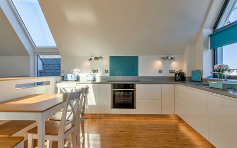 Greenway: Interior Design, Flooring, Kitchen, Wood, Ceiling, Furniture, Floor, Countertop, Light Fixture, Lighting