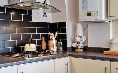 Westward Ho 604: Kitchen Appliance, Kitchen, Countertop, Kitchen Stove, Major Appliance, Home Appliance, Stove, Interior Design, Gas Stove, Flooring