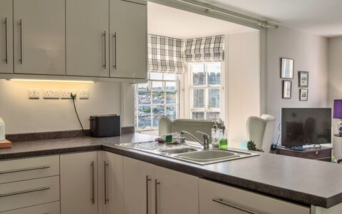 Westward Ho 604: Kitchen, Countertop, Interior Design, Kitchen Appliance, Furniture, Major Appliance, Cabinetry, Flooring, Ceiling, Home Appliance