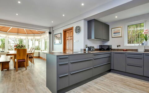 Cliff Lodge: Flooring, Kitchen, Interior Design, Furniture, Floor, Wood, Cabinetry, Countertop, Major Appliance, Kitchen Appliance