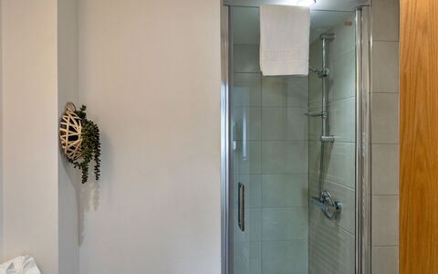 Harbour View: Wall, Bathroom, Interior Design, Flooring, Plumbing Fixture, Floor, Lighting, Plumbing, Shower, Glass