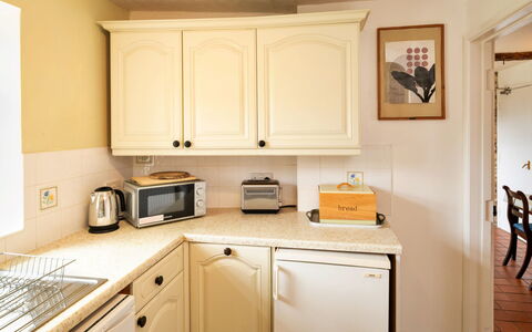 Lea Hill, Nuthatch: Countertop, Kitchen, Kitchen Appliance, Cabinetry, Interior Design, Major Appliance, Wood, Furniture, Flooring, Lighting