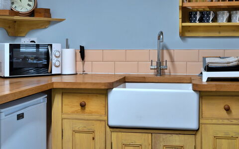 Palm Cott: Wood, Plumbing Fixture, Countertop, Flooring, Cabinetry, Kitchen, Interior Design, Tap, Plumbing, Sink