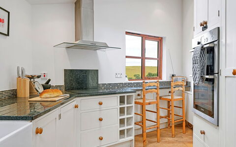 Larkrise: Flooring, Interior Design, Cabinetry, Wood, Kitchen, Countertop, Floor, Kitchen Appliance, Home, Ceiling