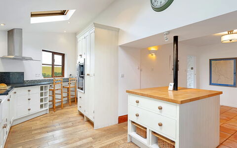 Larkrise: Furniture, Flooring, Interior Design, Cabinetry, Wood, Kitchen, Countertop, Floor, Ceiling, Kitchen Appliance