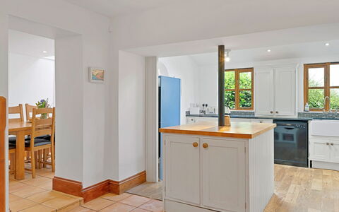 Larkrise: Flooring, Furniture, Interior Design, Wall, Floor, Wood, Cabinetry, Countertop, Ceiling, Kitchen