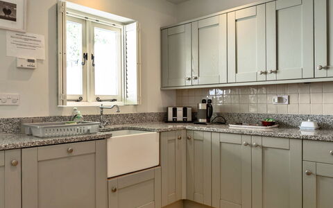 River Cottage: Kitchen, Countertop, Cabinetry, Kitchen Appliance, Interior Design, Flooring, Furniture, Wood, Major Appliance, Sink
