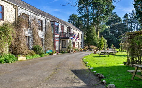 Trimstone Manor - Manor Cottage: Shrub, Home, Cottage, Garden, Estate, Driveway, Yard, Landscaping, Historic House, Backyard