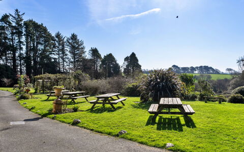 Trimstone Manor - Manor Cottage: Grass, Outdoor Bench, Shrub, Land Lot, Picnic Table, Garden, Lawn, Park, Landscaping, Outdoor Table
