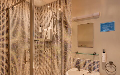Trimstone Manor - Granary Cottage: Bathroom, Plumbing Fixture, Wall, Interior Design, Flooring, Floor, Mirror, Plumbing, Bathroom Sink, Shower Head