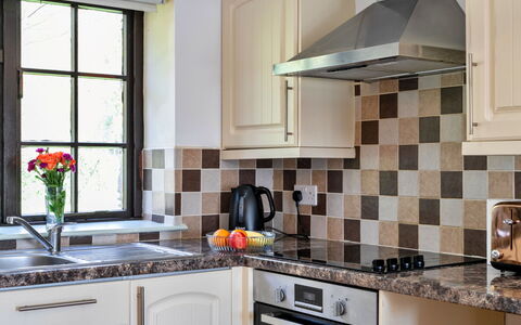 Trimstone Manor - Mill Cottage: Kitchen, Countertop, Interior Design, Flooring, Kitchen Appliance, Floor, Cabinetry, Plumbing Fixture, Tap, Room
