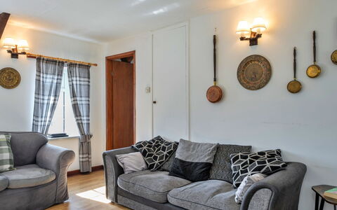 Trimstone Manor - Mill Cottage: Furniture, Interior Design, Couch, Wall, Flooring, Floor, Wood, Room, Living Room, Home