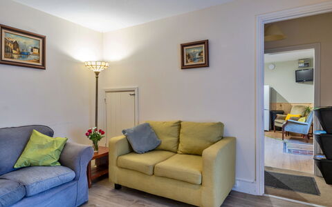 Trimstone Manor - Paddock Cottage: Furniture, Couch, Interior Design, Flooring, Wall, Floor, Wood, Living Room, Room, Apartment