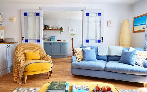 The Anchorage: Furniture, Interior Design, Couch, Wood, Flooring, Living Room, Room, Floor, Cushion, Textile