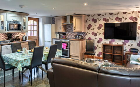 Ivy Cottage, Great Houndbeare Farm: Furniture, Interior Design, Wood, Flooring, Floor, Room, Ceiling, Couch, Lighting, Kitchen