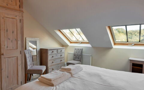 Cob Barn, Great Houndbeare Farm: Bed, Furniture, Interior Design, Bedroom, Flooring, Wood, Floor, Bed Sheet, Bedding, Ceiling