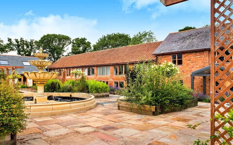 Cob Barn, Great Houndbeare Farm: Garden, Estate, Landscaping, Yard, Driveway, Flagstone, Courtyard, Walkway, Brick, Eco Hotel