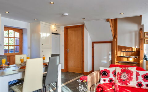 Poppy Cottage, Great Houndbeare Farm: Furniture, Interior Design, Wood, Flooring, Room, Ceiling, Floor, Lighting, Couch, Living Room