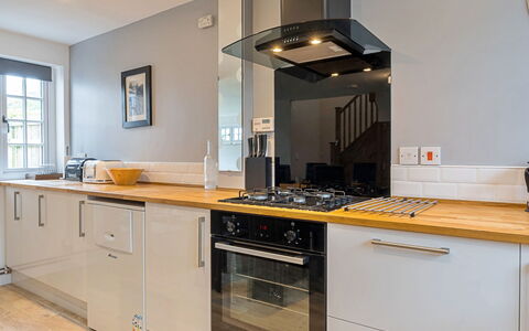 The Heselwood Coach House: Kitchen, Countertop, Major Appliance, Kitchen Appliance, Flooring, Interior Design, Wood, Cabinetry, Home Appliance, Kitchen Stove