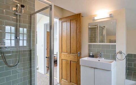 The Heselwood Coach House: Wall, Plumbing Fixture, Flooring, Interior Design, Bathroom, Floor, Wood, Sink, Bathroom Sink, Tap
