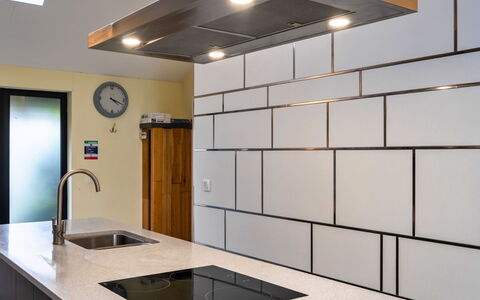 Pig Cottage at Dairy Cottages: Kitchen, Interior Design, Ceiling, Flooring, Countertop, Kitchen Appliance, Lighting, Light Fixture, Kitchen Stove, Major Appliance