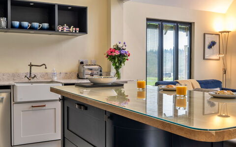 Ploughman'S Row No. 3 at Dairy Cottages: Furniture, Interior Design, Kitchen, Countertop, Wood, Cabinetry, Flooring, Kitchen Appliance, Lighting, Light Fixture