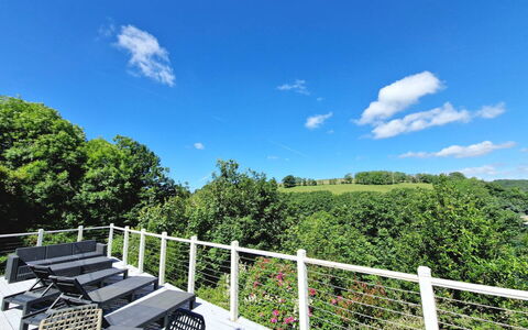 Three Quarter Cottage: Handrail, Fence, Balcony, Landscaping, Cumulus, Outdoor Furniture, Porch, Deck, Baluster, Home Fencing