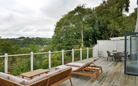 Three Quarter Cottage: Wood, Porch, Furniture, Outdoor Furniture, Wood Flooring, Deck, Hardwood, Balcony, Chair, Plank