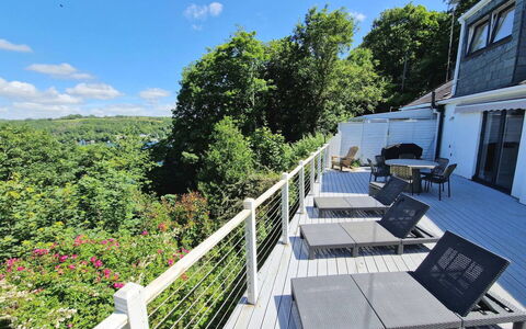 Three Quarter Cottage: Handrail, Fence, Deck, Balcony, Porch, Outdoor Furniture, Shade, Chair, Eco Hotel, Hardwood