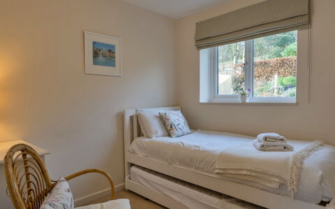Smugglers Loft at Mixtow Creek: Furniture, Bed, Interior Design, Bedroom, Wall, Floor, Bedding, Bed Sheet, Wood, Flooring