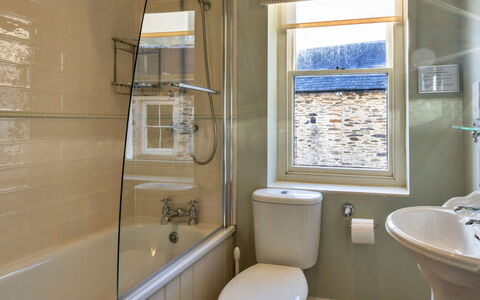 Captain'S Cottage at Mixtow Creek: Bathroom, Toilet Seat, Wall, Plumbing Fixture, Toilet, Flooring, Interior Design, Floor, Plumbing, Bathtub