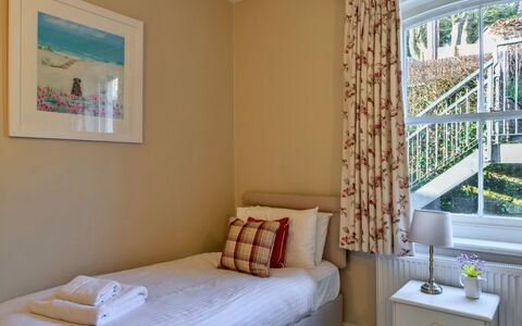 Captain'S Cottage at Mixtow Creek: Furniture, Bed, Interior Design, Bedroom, Wall, Bedding, Bed Sheet, Floor, Flooring, Wood