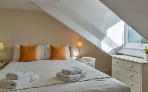 Bosuns Loft at Mixtow Creek: Bed, Interior Design, Furniture, Bedroom, Bed Sheet, Flooring, Bedding, Floor, Wood, Ceiling