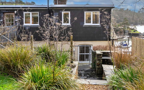 Bosuns Loft at Mixtow Creek: House, Shrub, Residential Area, Home, Cottage, Garden, Sash Window, Siding, Backyard, Yard