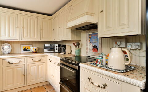 Wallis Cottage: Kitchen Appliance, Kitchen, Cabinetry, Countertop, Major Appliance, Wood, Drawer, Interior Design, Furniture, Cupboard