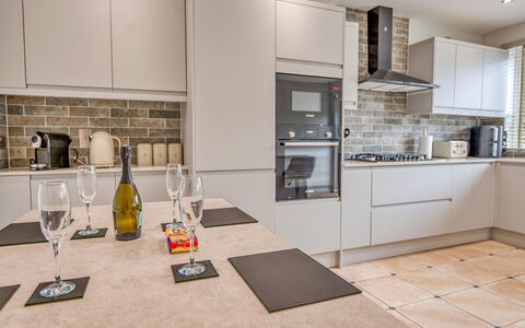 Dockyard House: Kitchen Appliance, Kitchen, Countertop, Cabinetry, Interior Design, Major Appliance, Flooring, Furniture, Home Appliance, Wood