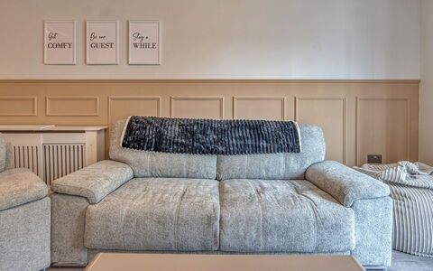 Dockyard House: Furniture, Couch, Linens, Living Room, Comfort, Sofa Bed, Pillow, Throw Pillow