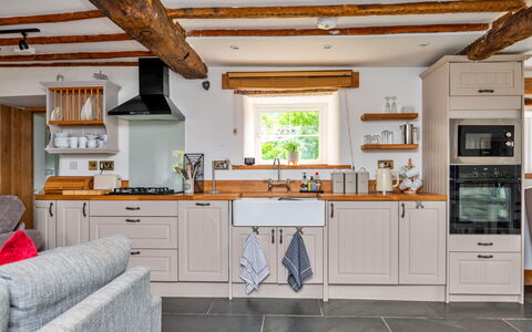Penclogwynau: Kitchen, Flooring, Countertop, Furniture, Wood, Interior Design, Cabinetry, Floor, Ceiling, Home