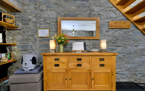 Garreg Ddu: Furniture, Wall, Interior Design, Wood, Flooring, Floor, Room, Lighting, Living Room, Cabinetry
