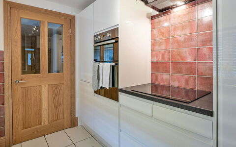 Garreg Ddu: Flooring, Interior Design, Wall, Wood, Floor, Cabinetry, Countertop, Kitchen, Room, Furniture