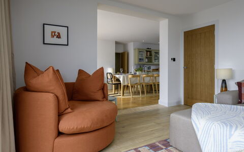 Hampton Coast: Furniture, Interior Design, Floor, Flooring, Couch, Wood, Room, Living Room, Wood Flooring, Ceiling