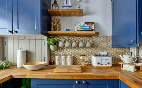 Brigwyn: Kitchen, Furniture, Cabinetry, Kitchen Appliance, Tableware, Countertop, Interior Design, Cupboard, Room