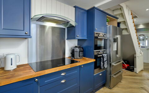 Brigwyn: Flooring, Wood, Cabinetry, Interior Design, Furniture, Floor, Ceiling, Kitchen, Kitchen Appliance, Major Appliance