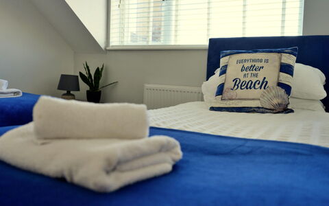 Brigwyn: Furniture, Bedroom, Bedding, Pillow, Linens, Bed, Bed Sheet, Throw Pillow, Hotel, Lamp
