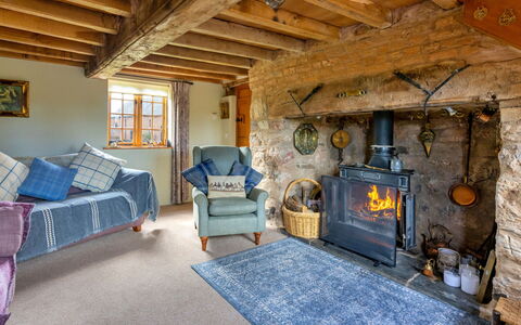Waen Farm Cottage: Wood, House, Furniture, Home, Cottage, Hardwood, Chimney, Chair, Farmhouse, Living Room