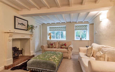 Dolhyfryd Lodge: Furniture, Interior Design, Wall, Couch, Flooring, Wood, Floor, Ceiling, Room, Living Room