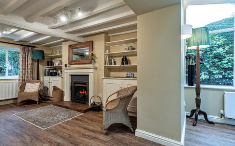 Dolhyfryd Lodge: Furniture, Interior Design, Flooring, Wall, Wood, Floor, Ceiling, Room, Living Room, Lighting