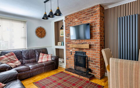 Ty Pen Y Bryn, Castle Views: Furniture, Interior Design, Wall, Flooring, Couch, Floor, Wood, Room, Living Room, Ceiling