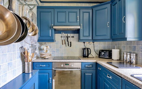 Ty Pen Y Bryn, Castle Views: Blue, Cabinetry, Kitchen, Kitchen Appliance, Furniture, Interior Design, Countertop, Wood, Flooring, Drawer